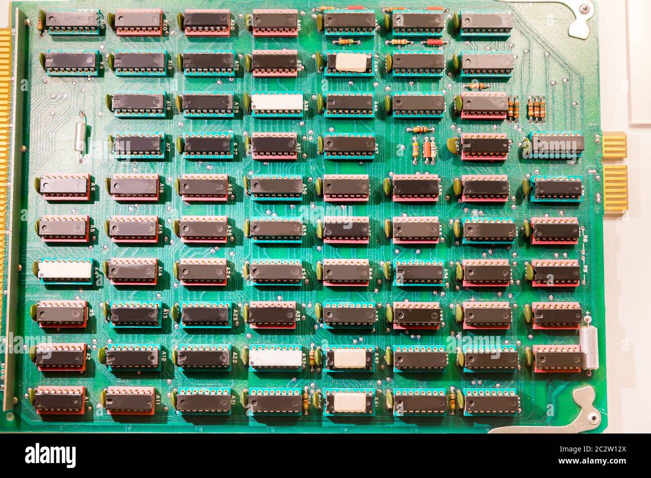 Many chips mounted on electronic plate. Analog microprocessor Stock