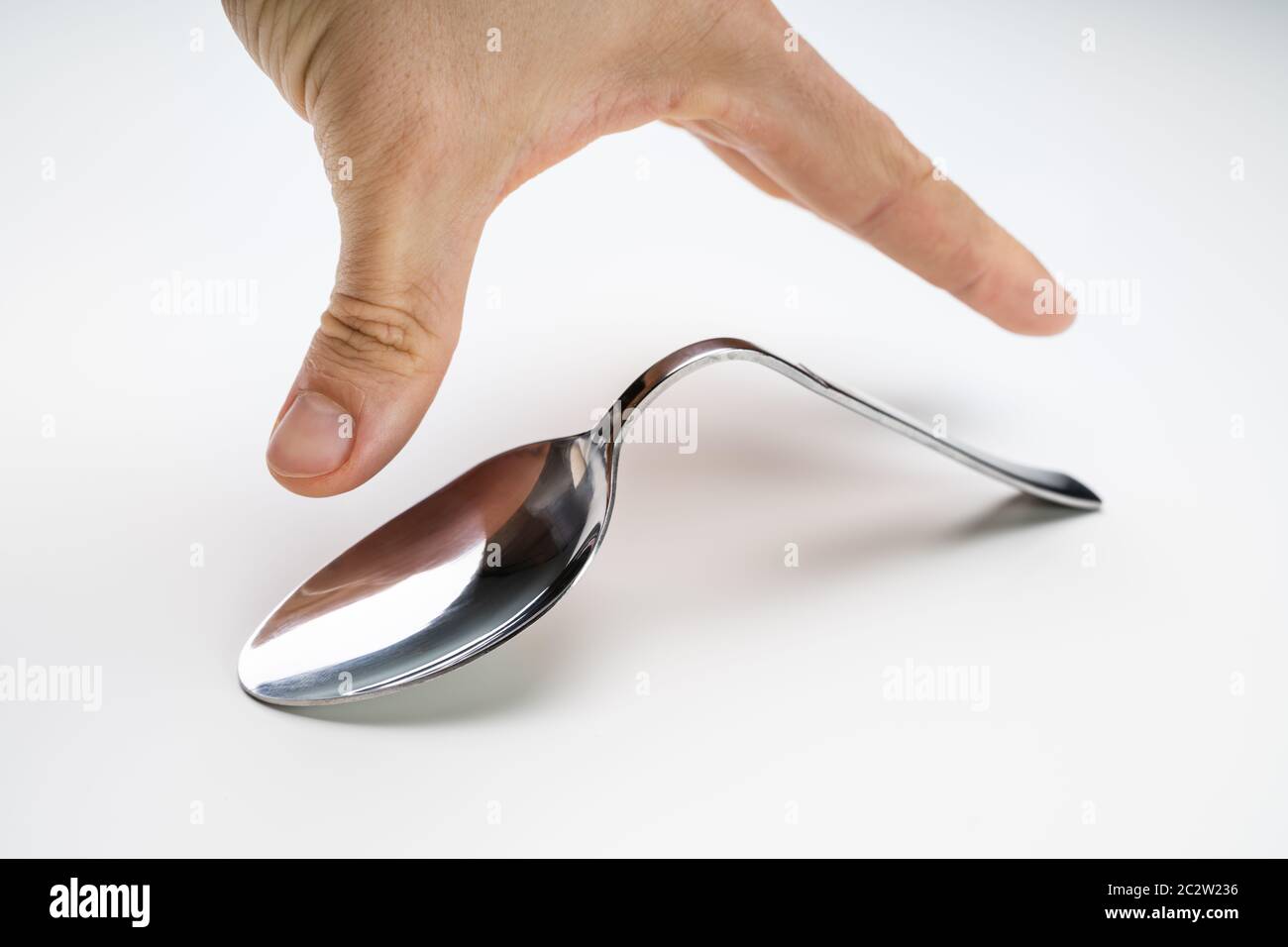 Bent metal spoon hires stock photography and images Alamy