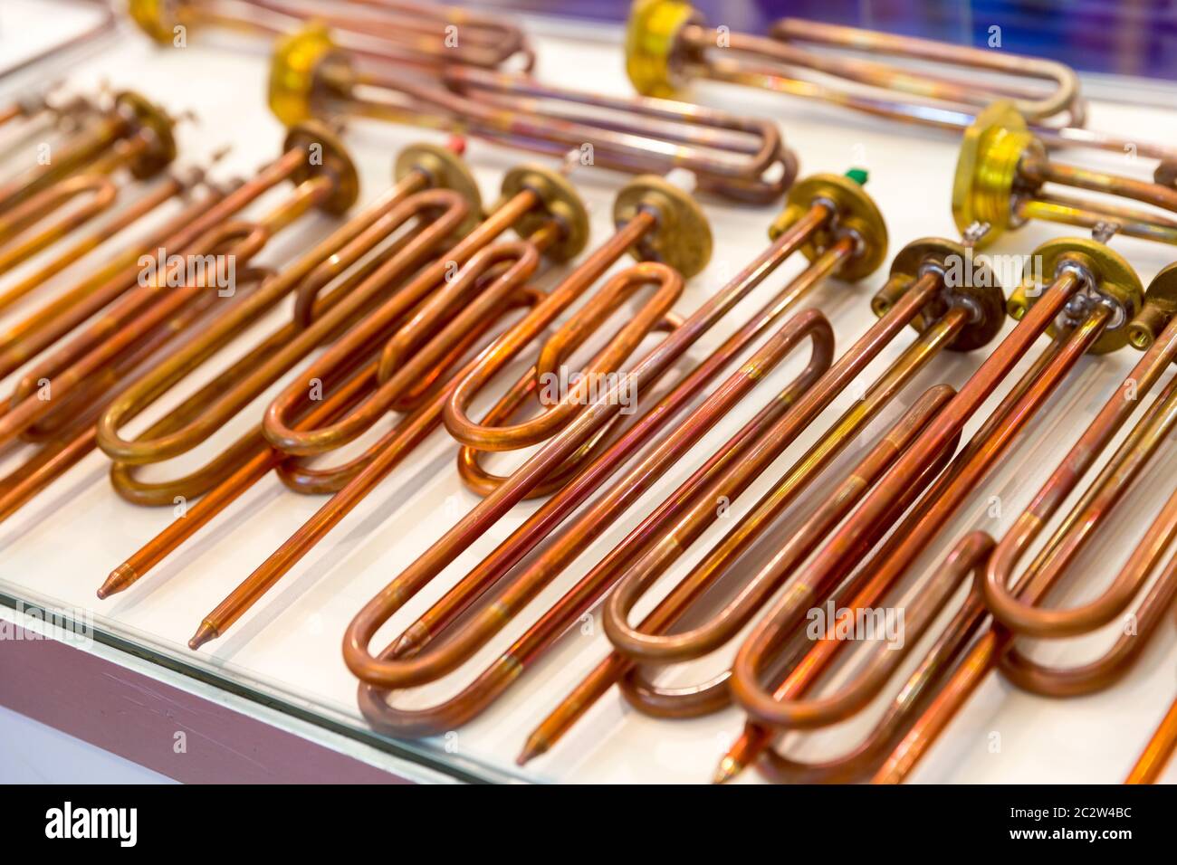 New copper heating elements for water boilers, closeup. Heaters for