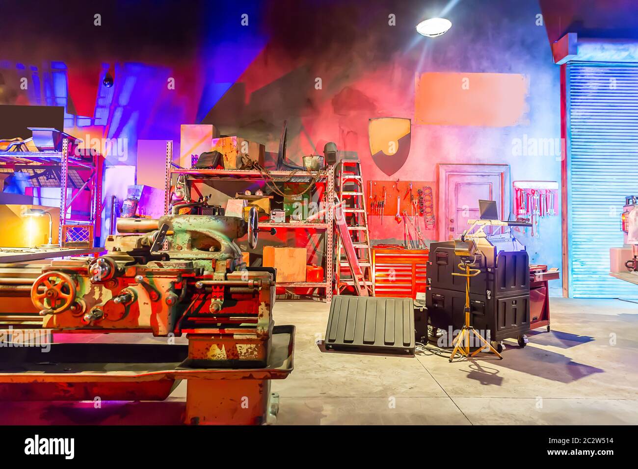 Garage workshop with tools. Machine, shelf, tools, ladder and workbench in garage Stock Photo