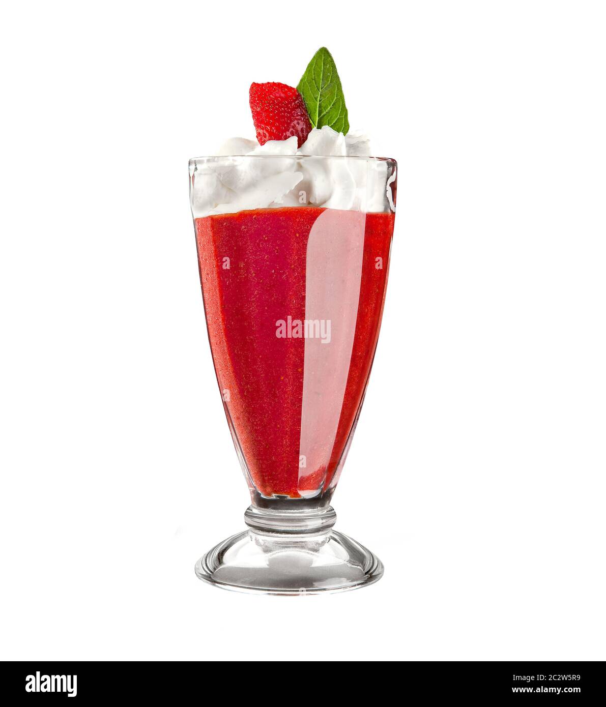 Big ice cream dessert with yogurt, fruit and whipped cream on a white