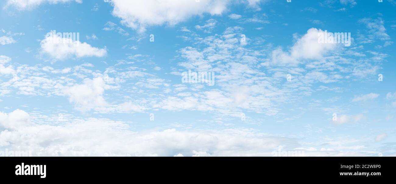Panoramic blue sky background with white clouds Stock Photo