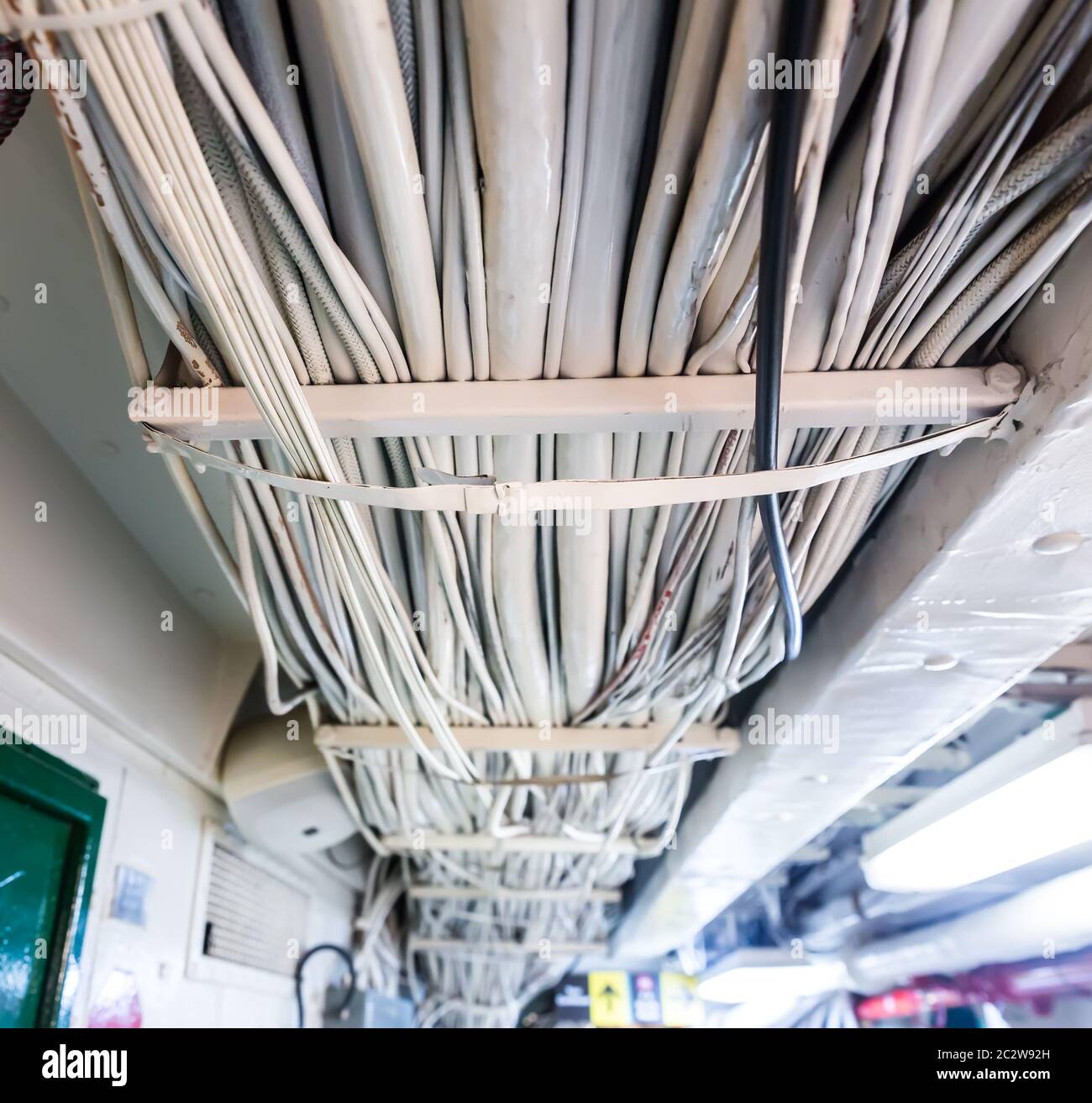 Military ship cable bunch. Electrical wires on aircraft carrier Stock