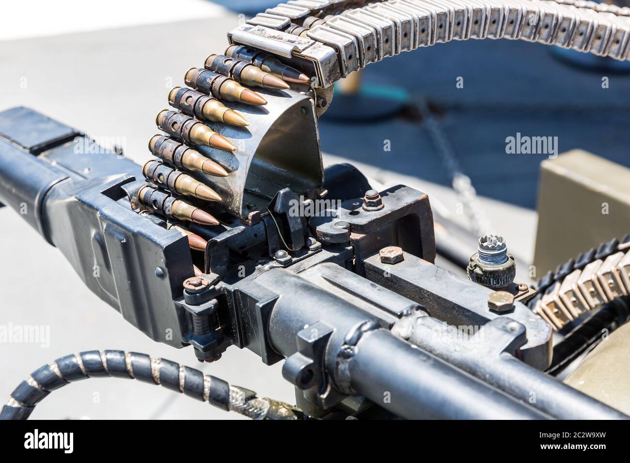 Closeup of helicopter machine gun with the loaded tape of bullets Stock ...