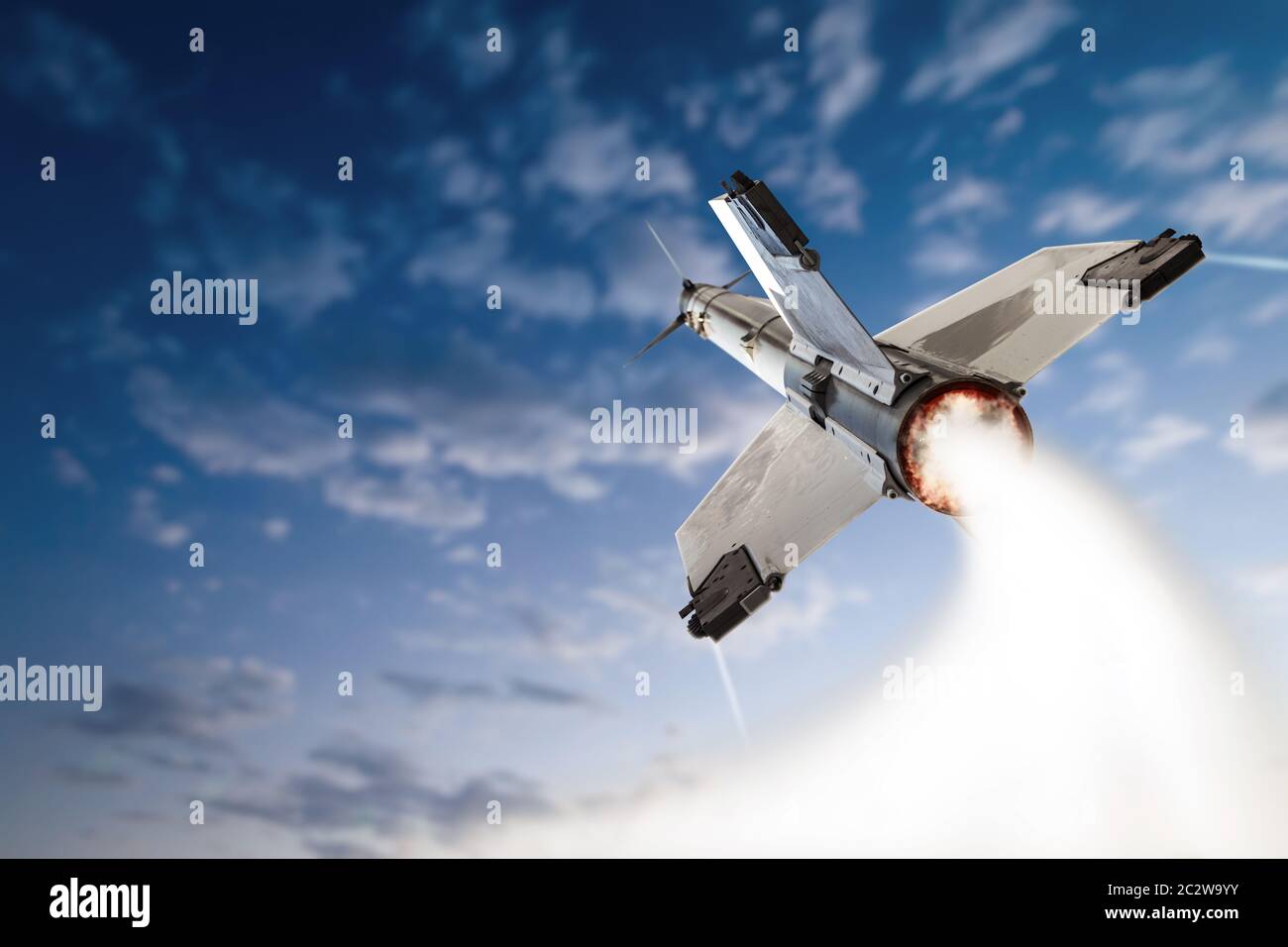 Flying-up militant missle with blue sky and clouds. Stock Photo