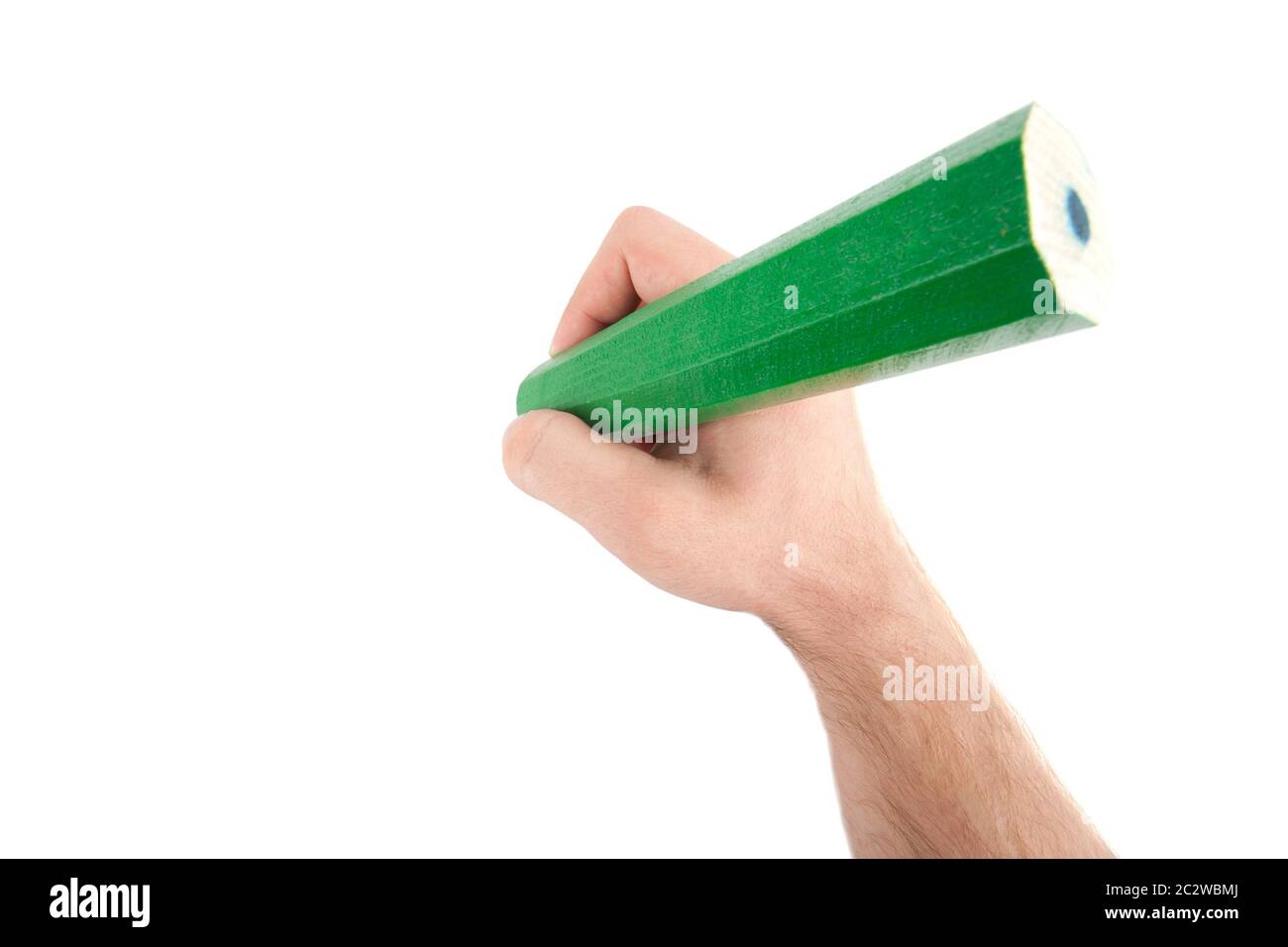 Hand with giant pencil. Isolated on white Stock Photo