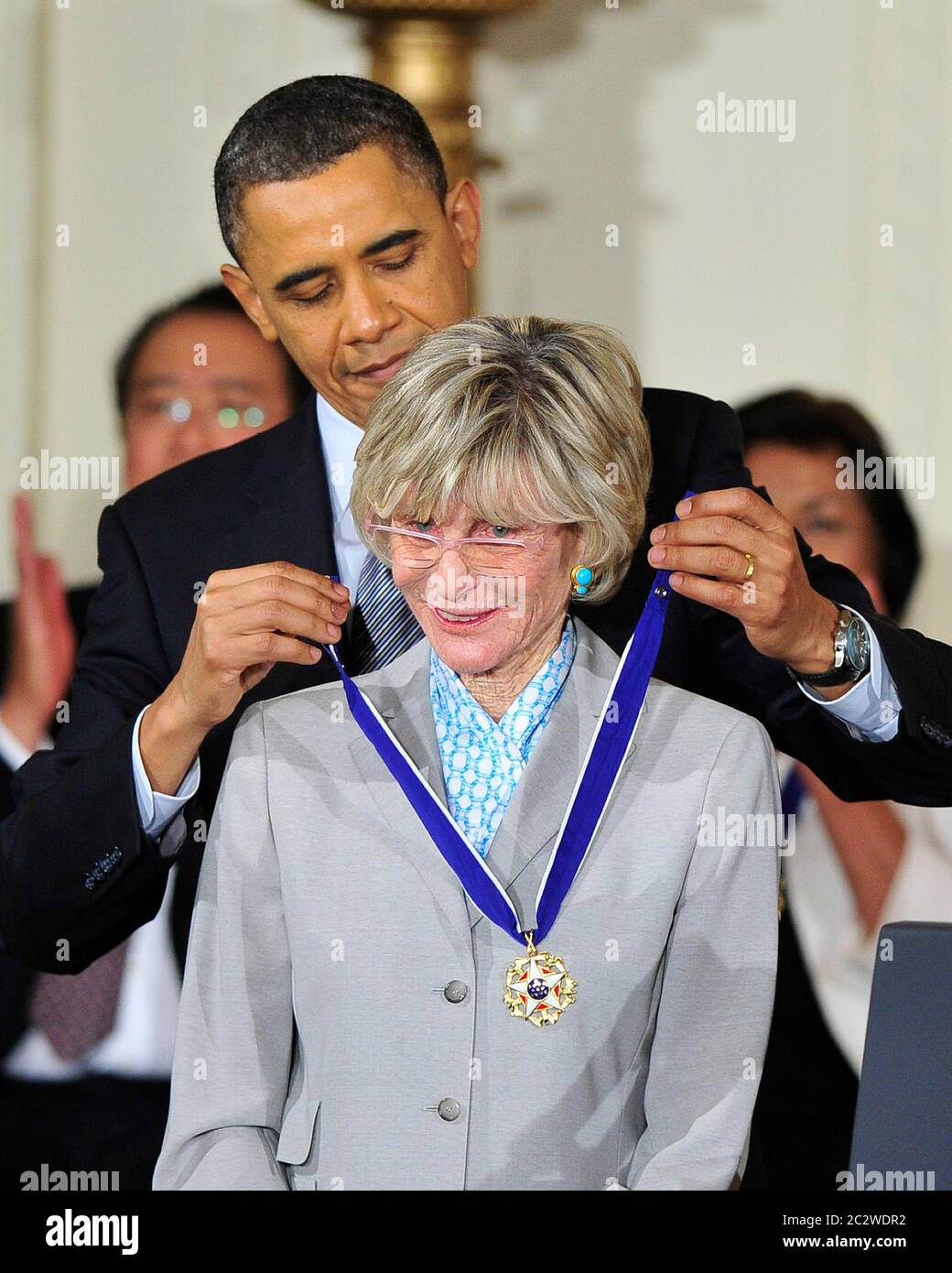 United States President Barack Obama and first lady Michelle Obama present the 2010 Medal of Freedom, 'the Nation's highest civilian honor presented to individuals who have made especially meritorious contributions to the security or national interests of the United States, to world peace, or to cultural or other significant public or private endeavors', to former U.S. Ambassador to Ireland Jean Kennedy Smith in a ceremony in the East Room of the White House in Washington, DC on Tuesday, February 15, 2011. Credit: Ron Sachs/CNP /MediaPunch Stock Photo