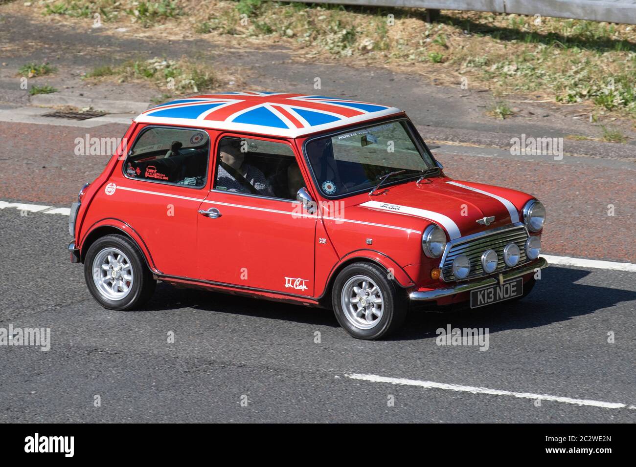 1993 90s nineties Rover Mini Cooper 1.3i; Vehicular traffic moving vehicles, cars driving vehicle on UK roads, 90s motors, motoring on the M6 motorway highway Stock Photo