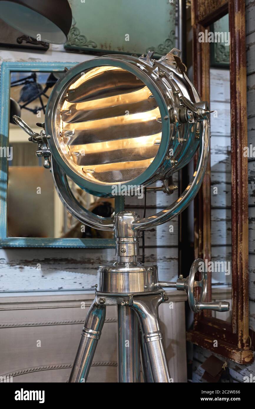 Retro Searchlight Floor Lamp at Tripod Decor Lighting Stock Photo