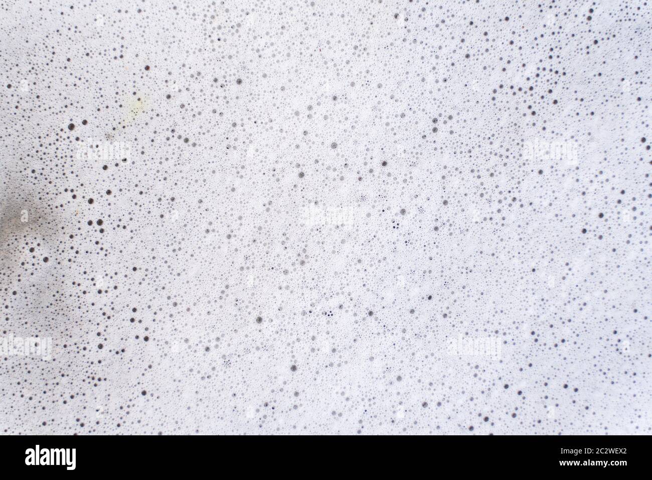 surface covered with soap foam. grunge background Stock Photo