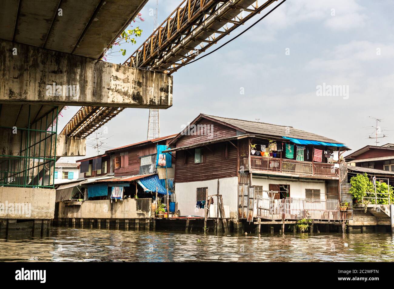 Ghetto on dirty canal in Thailand Stock Photo