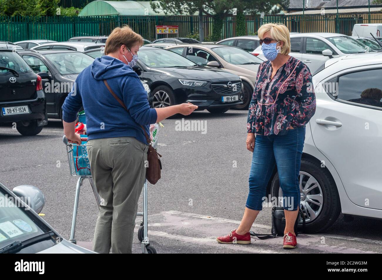 Bandon, West Cork, Ireland. 18th June, 2020. Two women wear face masks