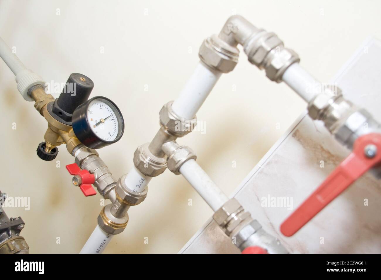 Manometer, pipes and armature Stock Photo