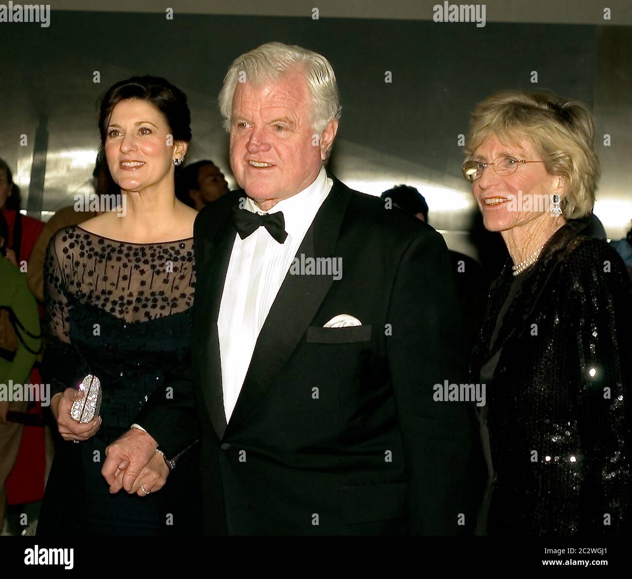 Washington, DC - December 4, 2005 -- United States Senator Ted Kennedy (Democrat of Massachusetts), center, arrives for the Kennedy Center Honors tapingwith his wife, Victoria, left, and sister, Jean Kennedy Smith, right, at the John F. Kennedy Center for the Performing Arts in Washington, DC on December 4, 2005.Credit: Ron Sachs/CNP | usage worldwide Stock Photo