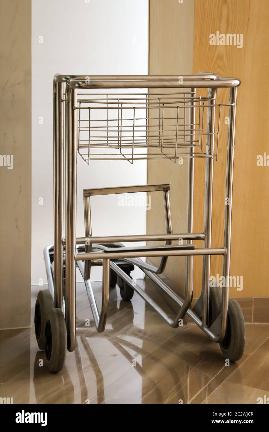 Trolleys in a hotel lobby are waiting for their use Stock Photo - Alamy