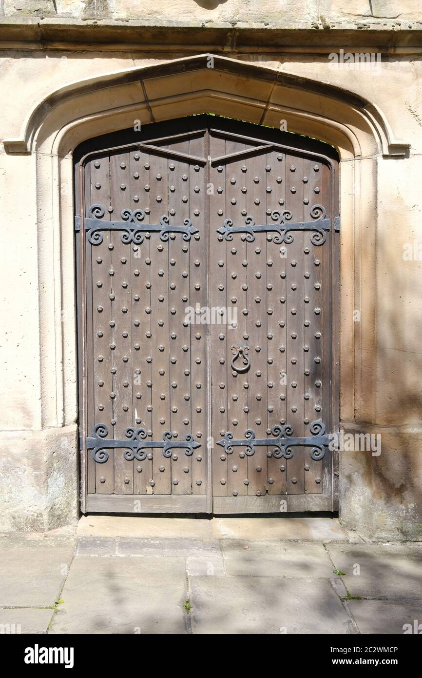 Gothic door with iron studs and hinges Stock Photo Alamy