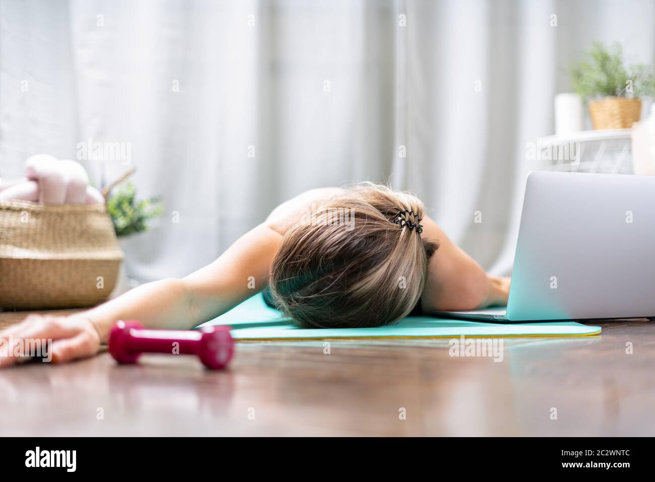 Woman falling asleep. Tired after exercise and workout. Overtraining