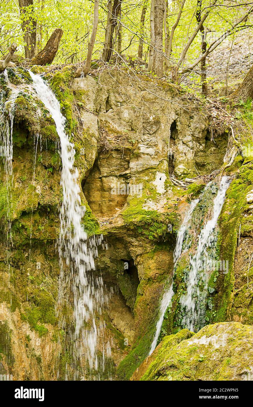 Small Waterfall Between Rocks Small waterfall between stones hi-res stock photography and images - Alamy
