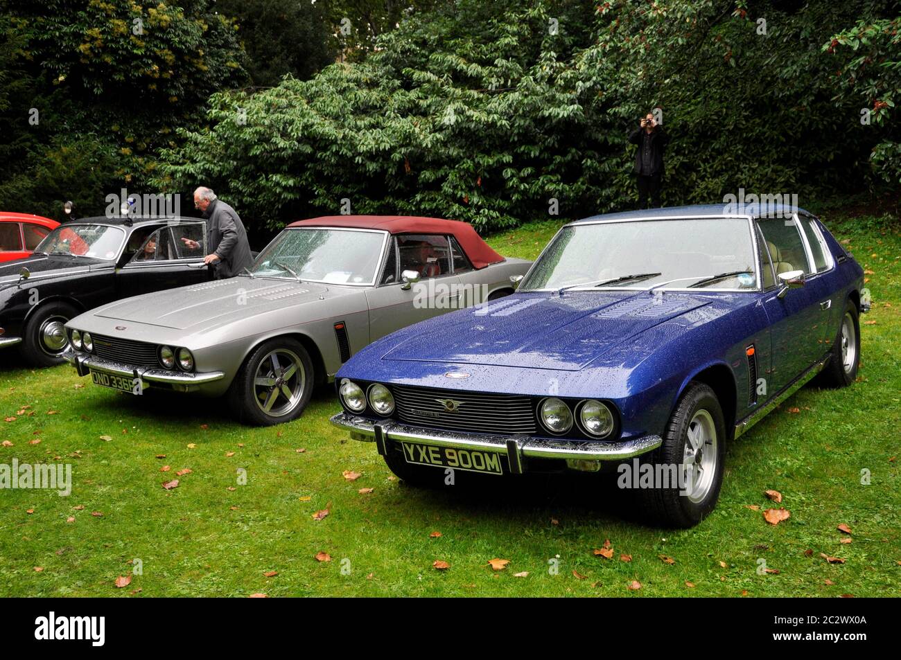 Two Jensen Interceptor, one coupe and one convertible, at Chelsea Autolegends car show. Stock Photo