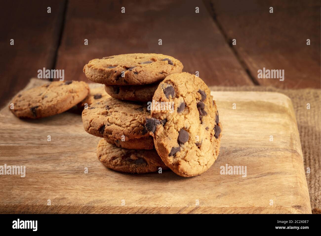 Chocolate chip cookies, gluten free, a closeup of a stack on a dark