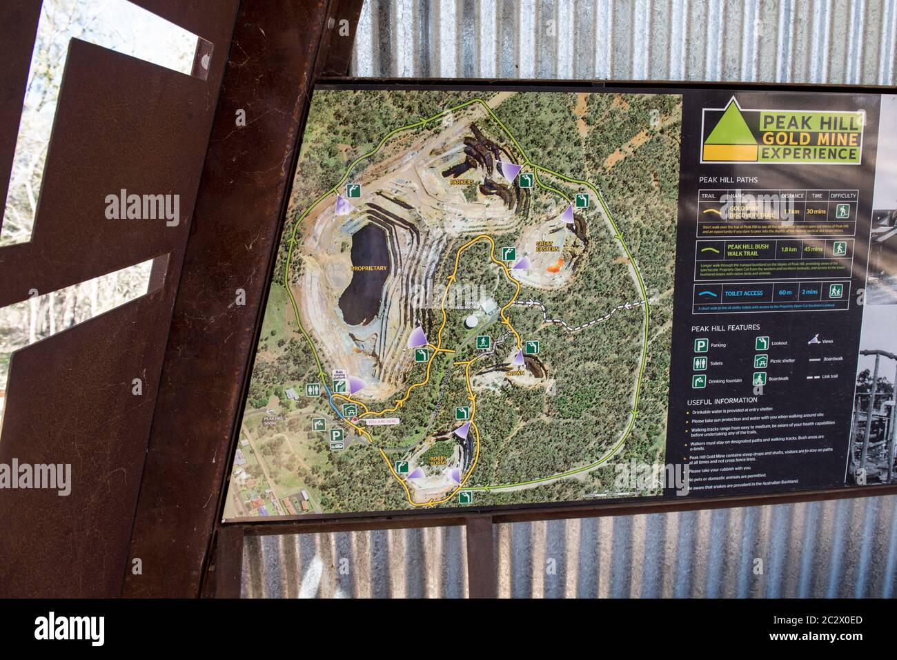 Open cut gold mining complex in Peak Hill, New South Wales, Australia. Pictured is a map showing the walking tracks around the mining complex. Stock Photo