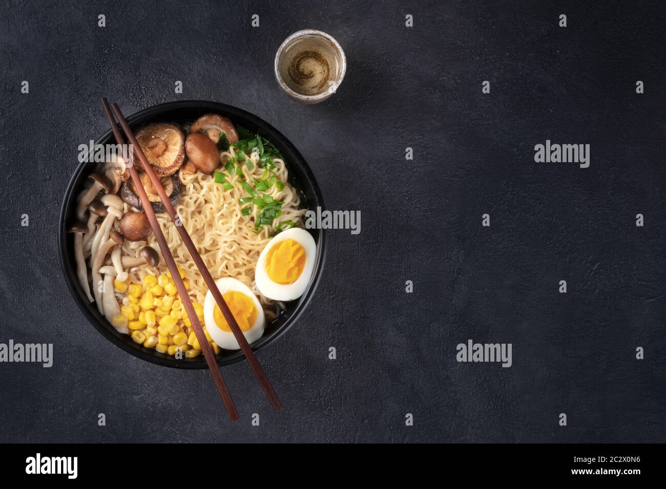Ramen. Soba noodles soup with an egg, shiitake and enoki mushrooms