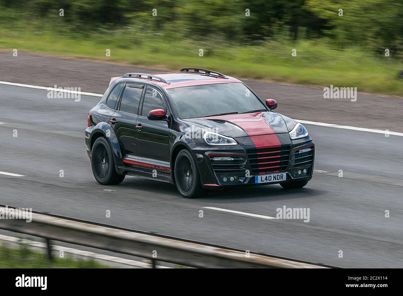 04 Black Red Porsche Cayenne S Tiptronic Vehicular Traffic Moving Vehicles Cars Driving Vehicle On Uk Roads Motors Motoring On The M6 Motorway Stock Photo Alamy