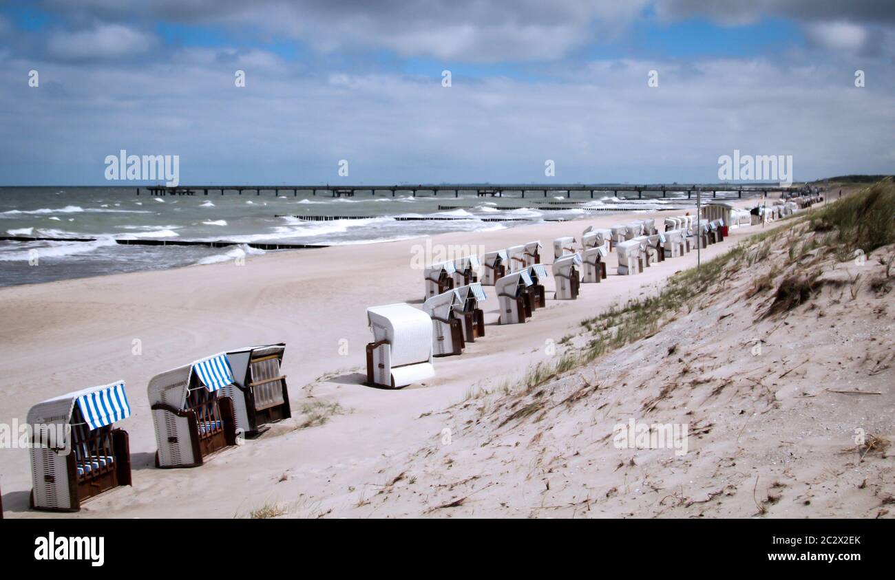 Beach chairs on the Baltic Sea, stormy sea with beach chairs on the Baltic Sea beach Stock Photo