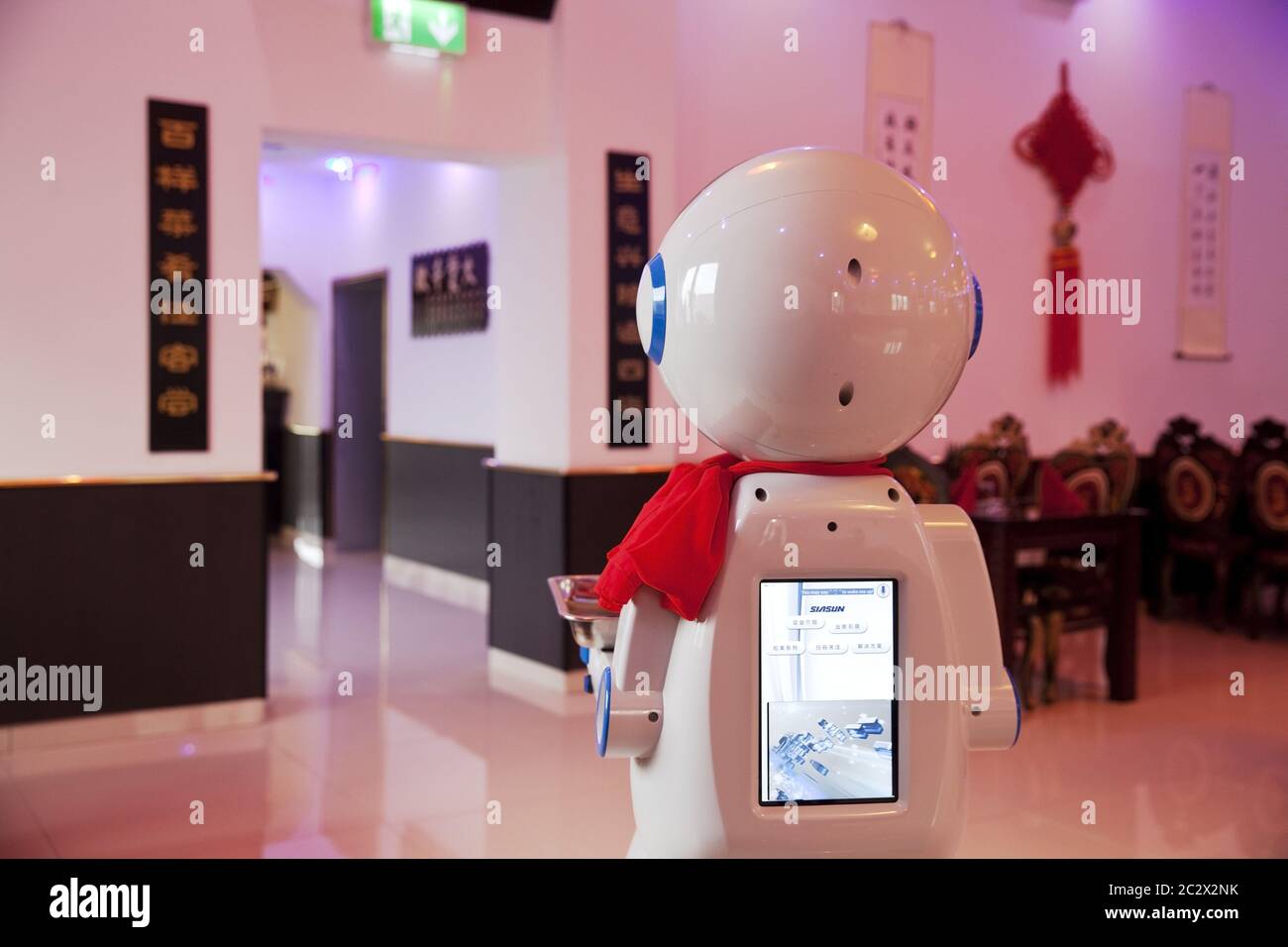 service robot in a Chinese restaurant, Germany, Europe Stock Photo - Alamy