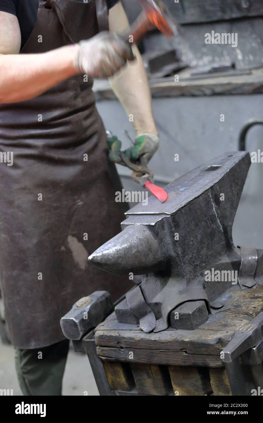The process of manufacturing a craft product in a forge Stock Photo - Alamy