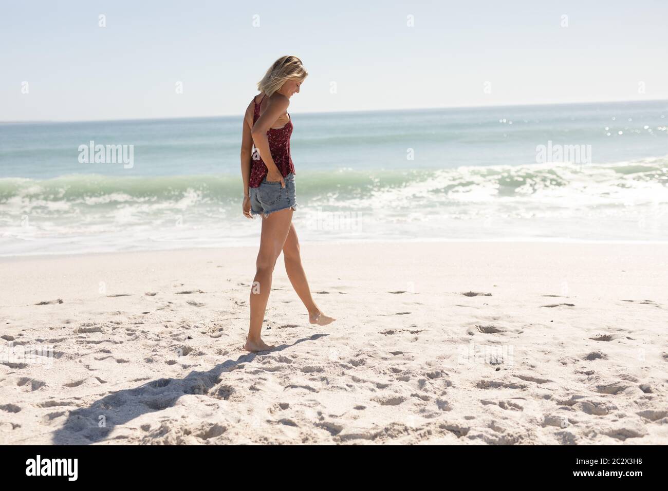 Young woman walking barefoot on hi-res stock photography and images - Alamy