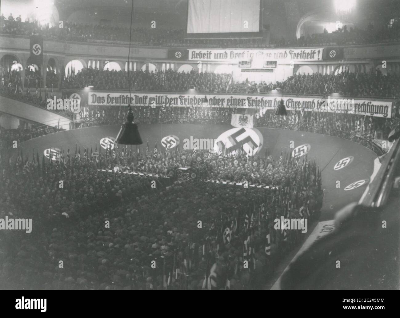 Rally in the Berlin Sportpalast Heinrich Hoffmann Photographs 1933 Adolf Hitler's official photographer, and a Nazi politician and publisher, who was a member of Hitler's intimate circle. Stock Photo