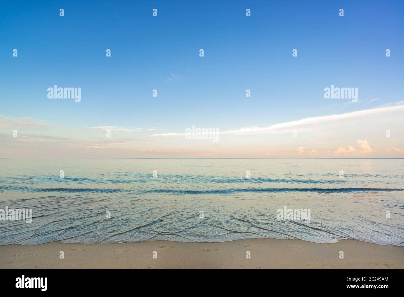 Beautiful sunset at the Tropical beach Stock Photo - Alamy
