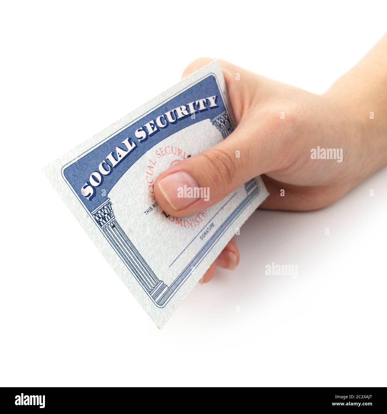 Hand holding social security on a white background. Stock Photo