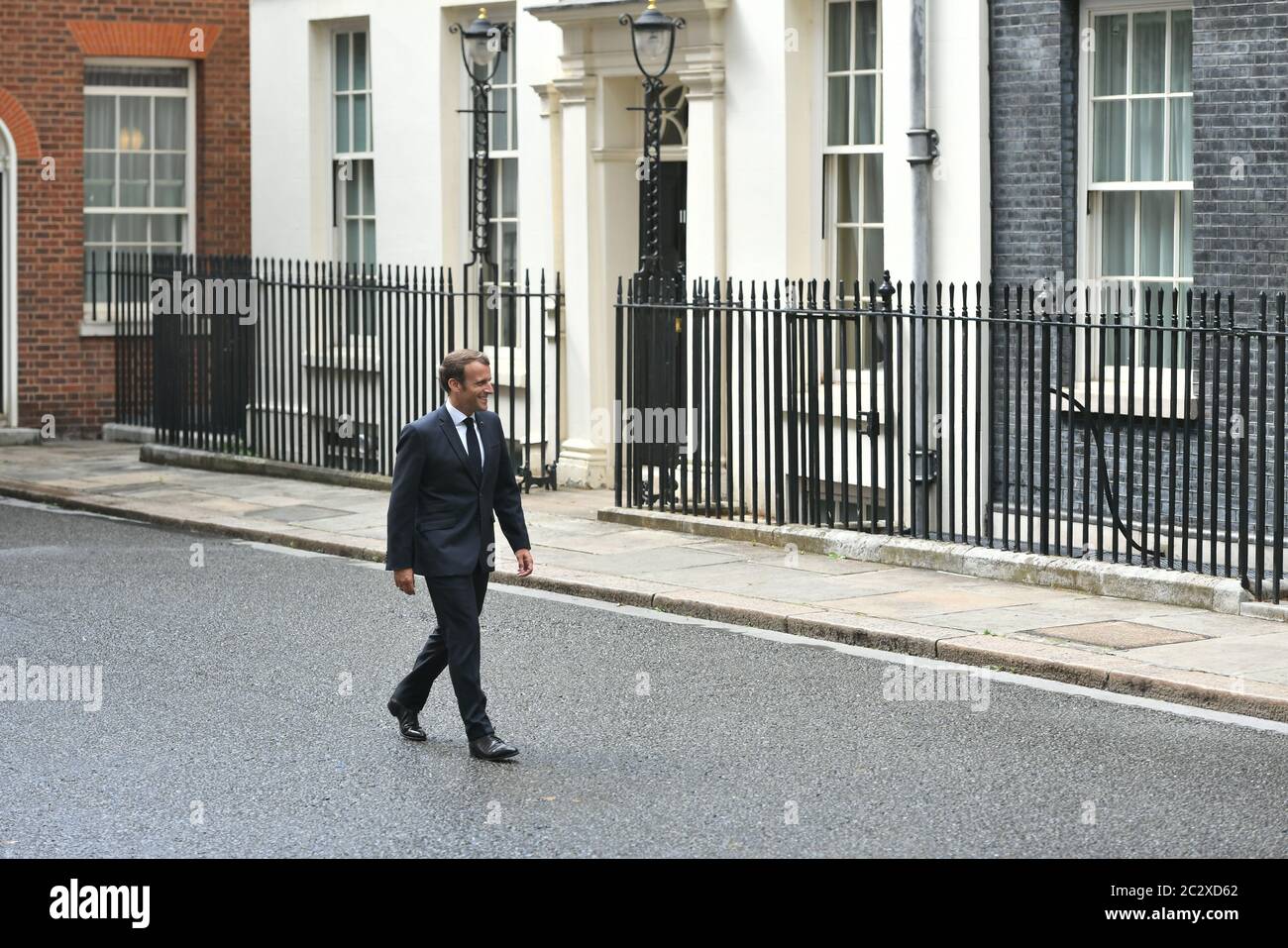 French president Emmanuel Macron arrives in Downing Street in London during his visit to the UK. Stock Photo