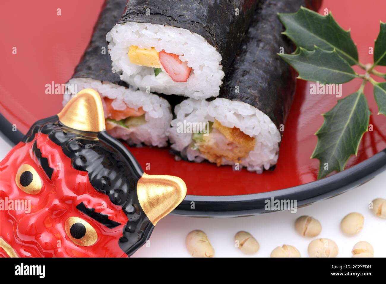 Japanese traditional Setsubun event, Masks of Oni demon and ehomaki sushi are used on an annual event Stock Photo