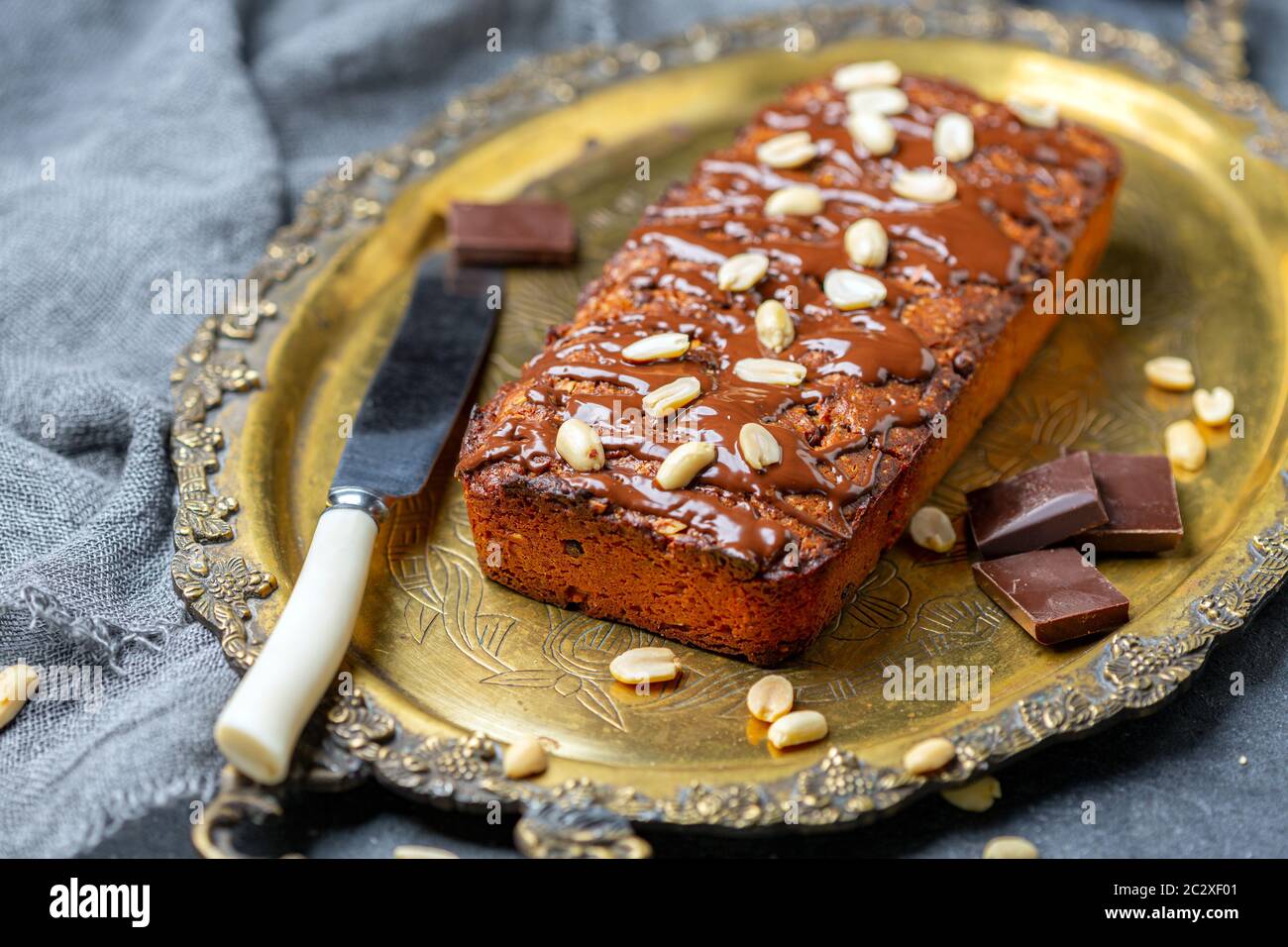 Chocolate cake with peanut butter and chocolate frosting. Stock Photo