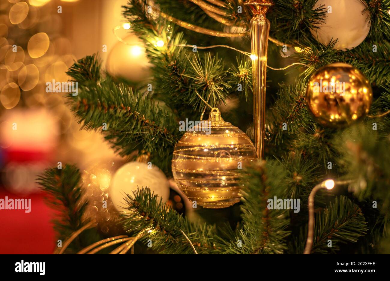 Christmas tree with silver bauble ornaments. Decorated Christmas tree