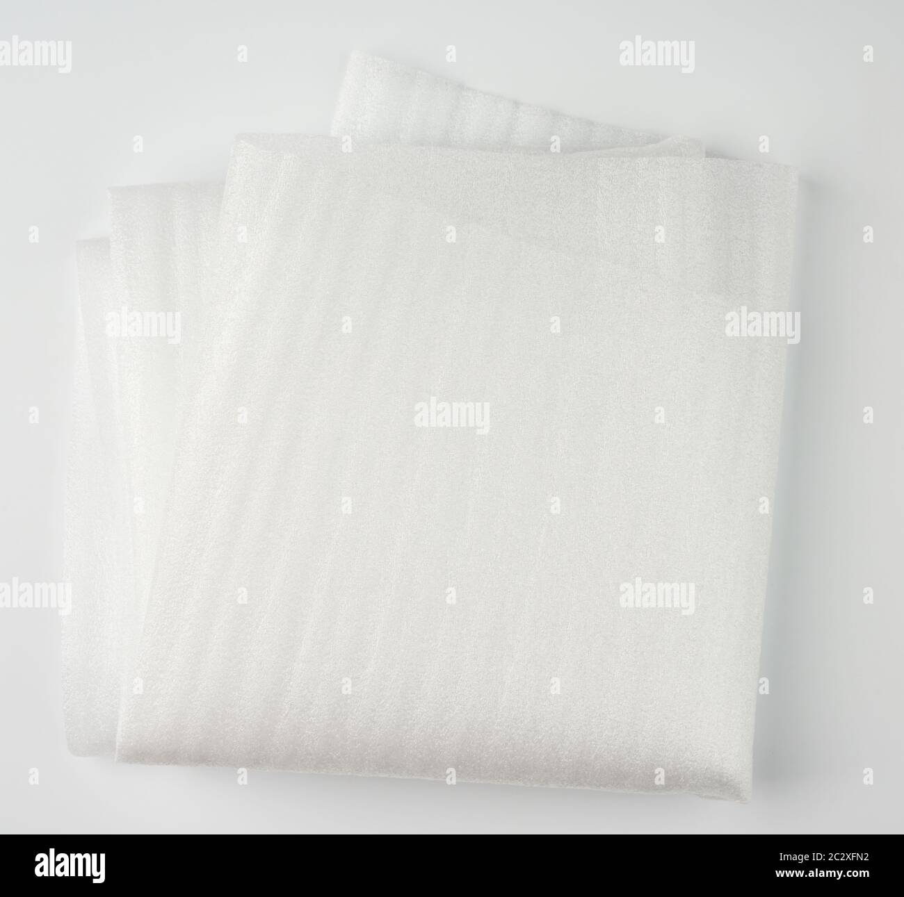 folded foam polyethylene for packing and transporting fragile goods and things, close up Stock Photo