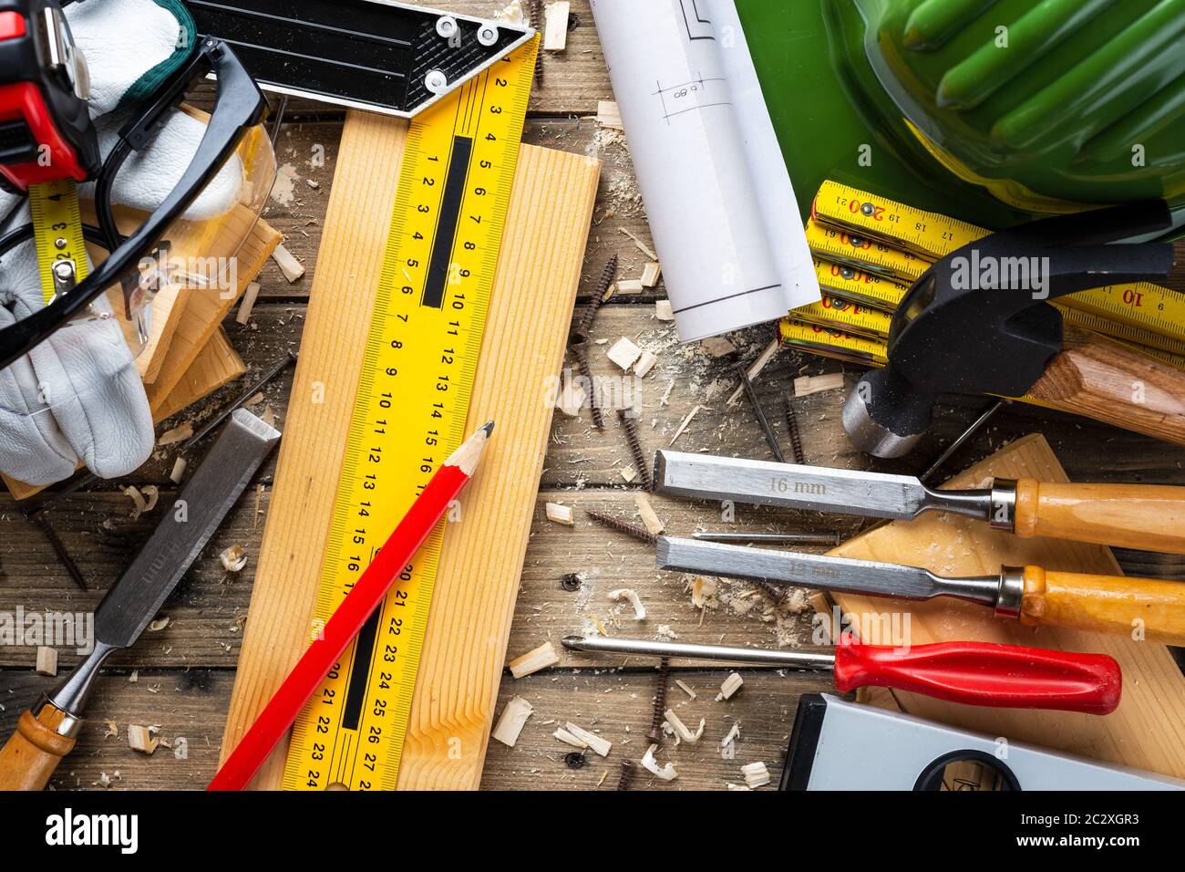 Top view of carpenter's tools on a wooden work table. Construction ...
