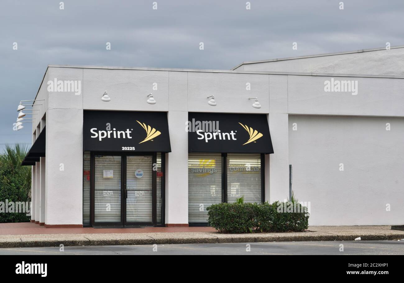 Sprint store exterior in Houston, TX. A USA telecommunications company founded in 1899 as Brown Telephone Company, it is now owned by T-Mobile. Stock Photo