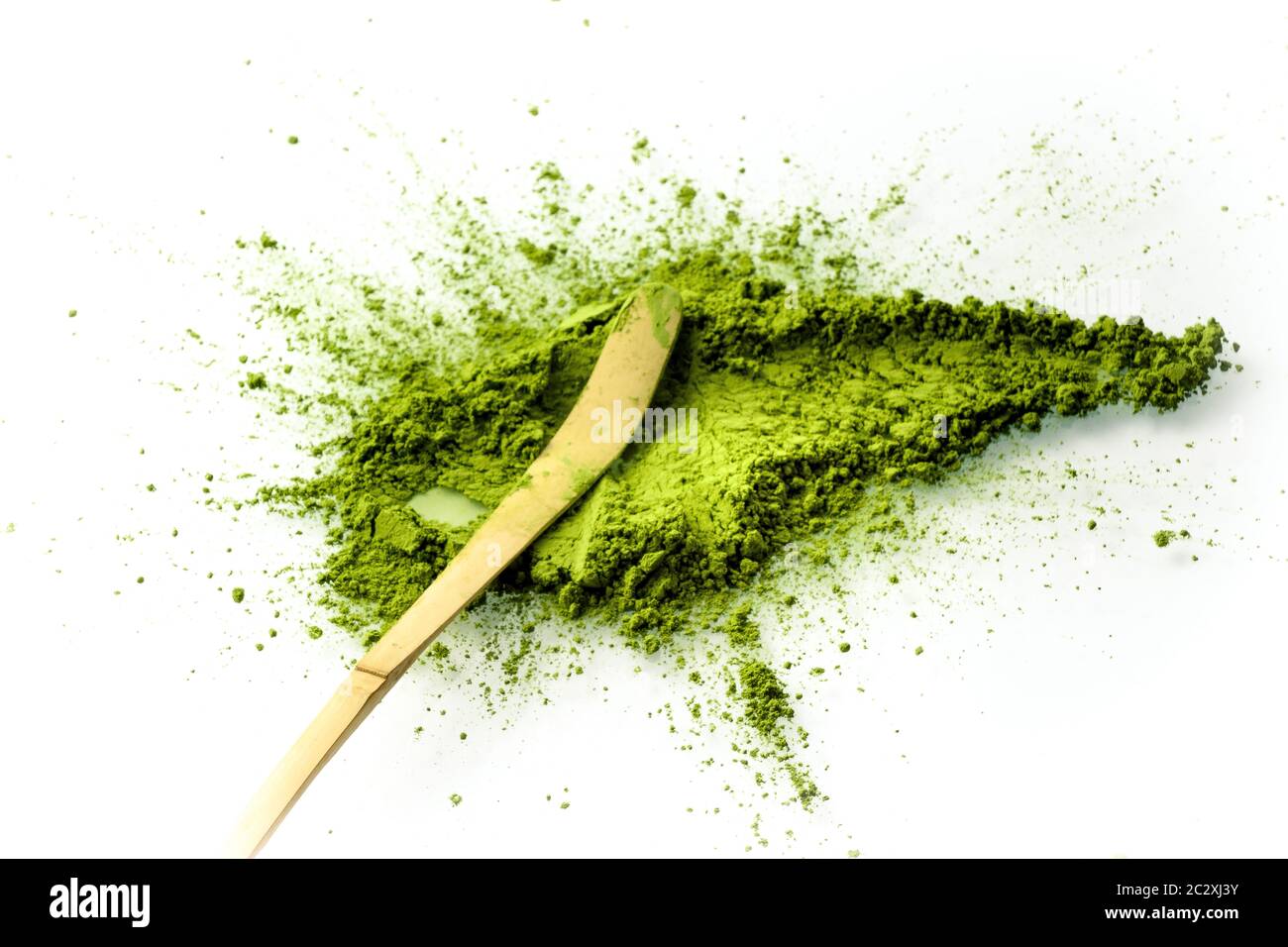 Matcha powder spread with a chashaku spoon. Matcha is made of finely ground green tea powder. It's very common in japanese culture. Matcha is healthy Stock Photo