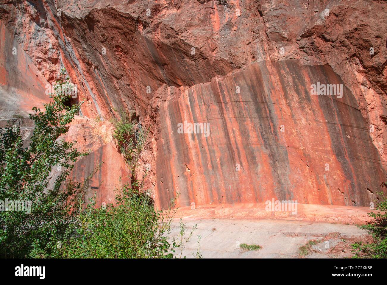 Abandoned quarry with the Engelsberger Red Marble in the eastern alps near Winzendorf in Austria. Stock Photo