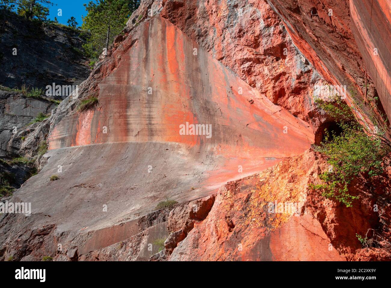 Abandoned quarry with the Engelsberger Red Marble in the eastern alps near Winzendorf in Austria. Stock Photo