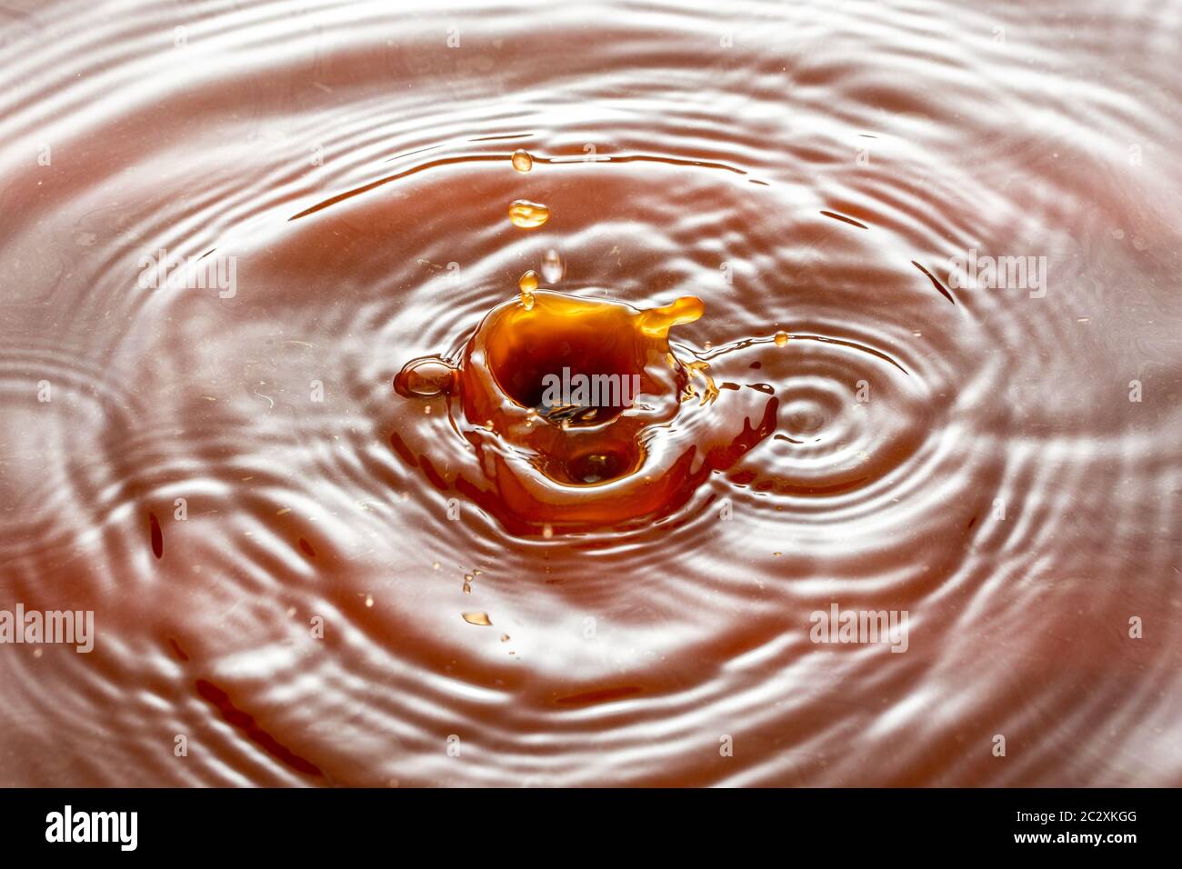 Rusty water drops splashing in dirty oily water, drops of stagnant ...