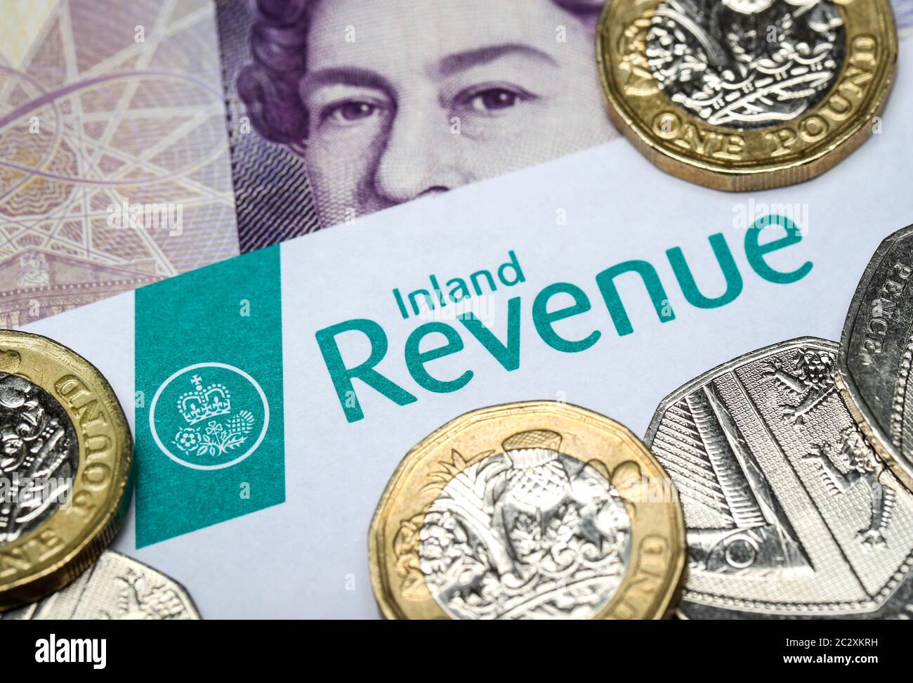 UK Inland Revenue form with British currency Stock Photo