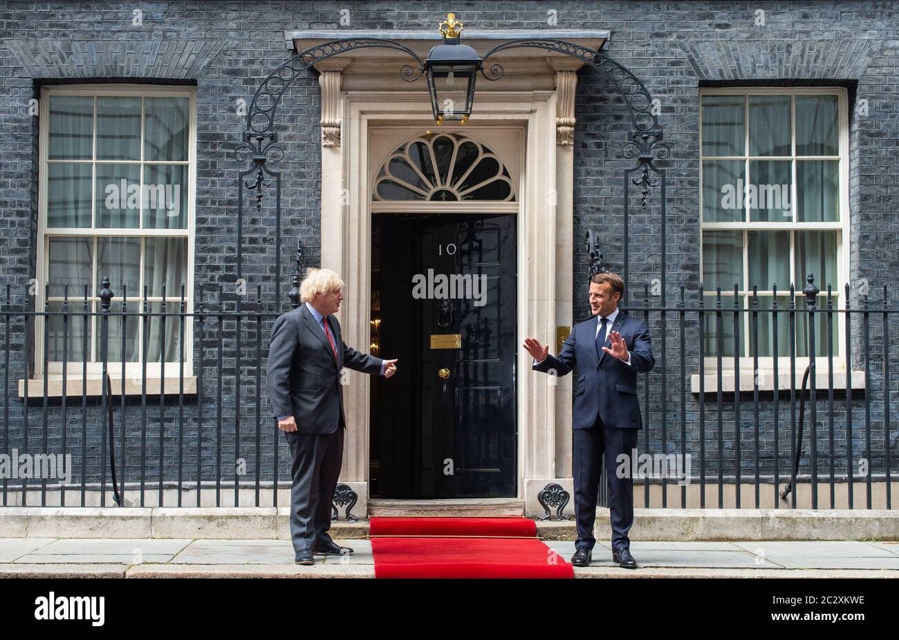 Prime Minister Boris Johnson welcomes French president Emmanuel Macron to Downing Street in London during his visit to the UK. Stock Photo