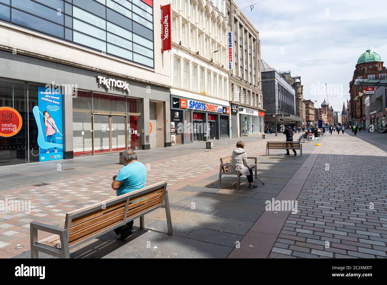 View of closed shops and few people on Argyle Street in Glasgow city