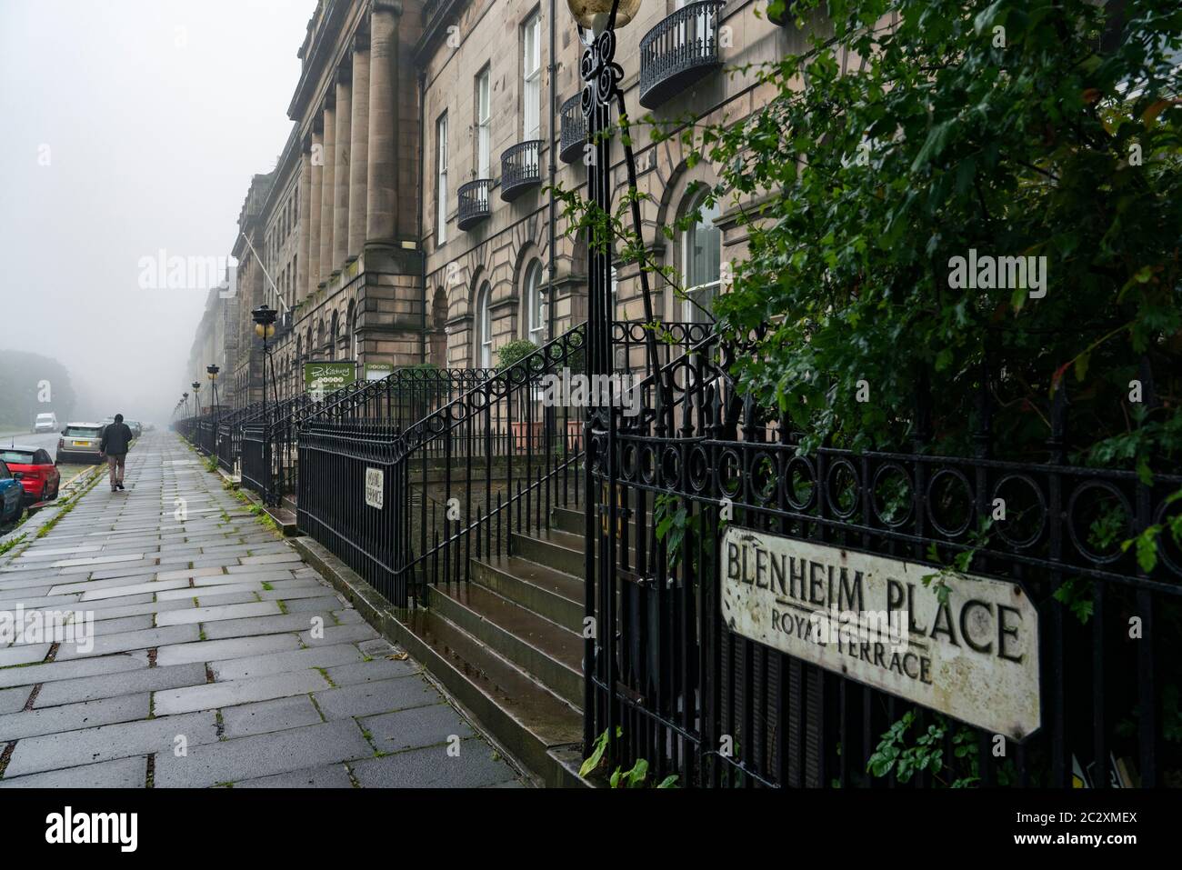View along Royal Terrace upmarket street on rainy day in Edinburgh, Scotland, UK Stock Photo