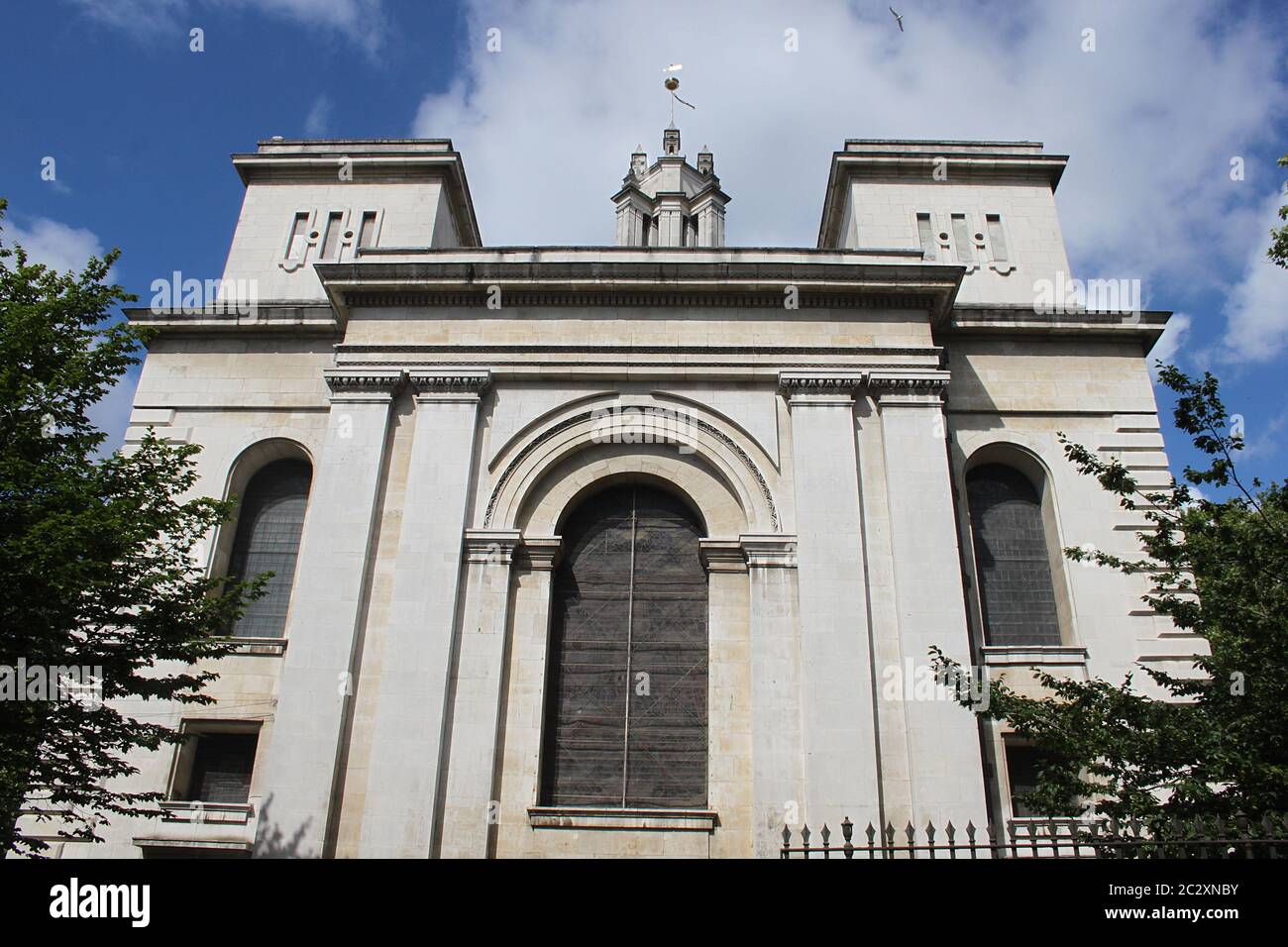 St Anne's Limehouse, designed by Nicholas Hawksmoor. It has many interesting architectural features, including 'modernist' towers at the east end. Stock Photo